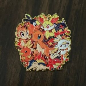 Pokemon Fiery Red and Gold Pin Charizard Charmander Fennekin